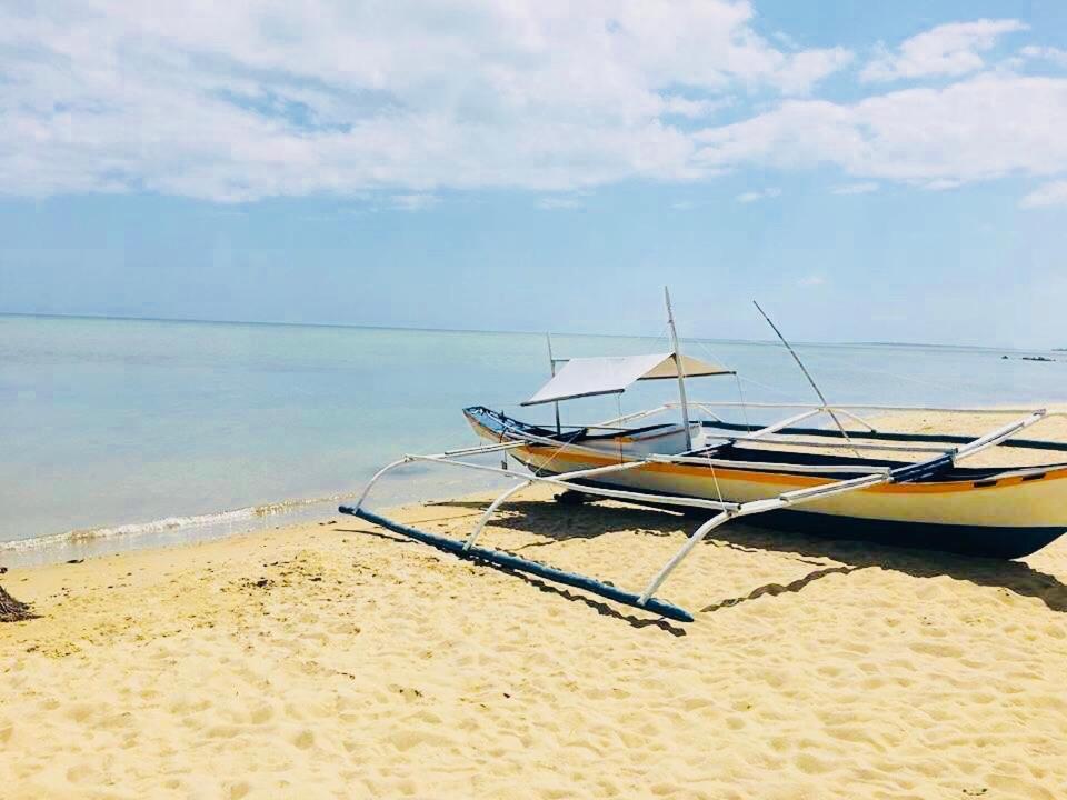 Mecaja Beach House Roxas  ภายนอก รูปภาพ
