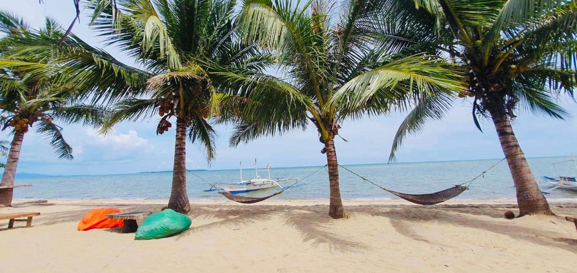 Mecaja Beach House Roxas  ภายนอก รูปภาพ