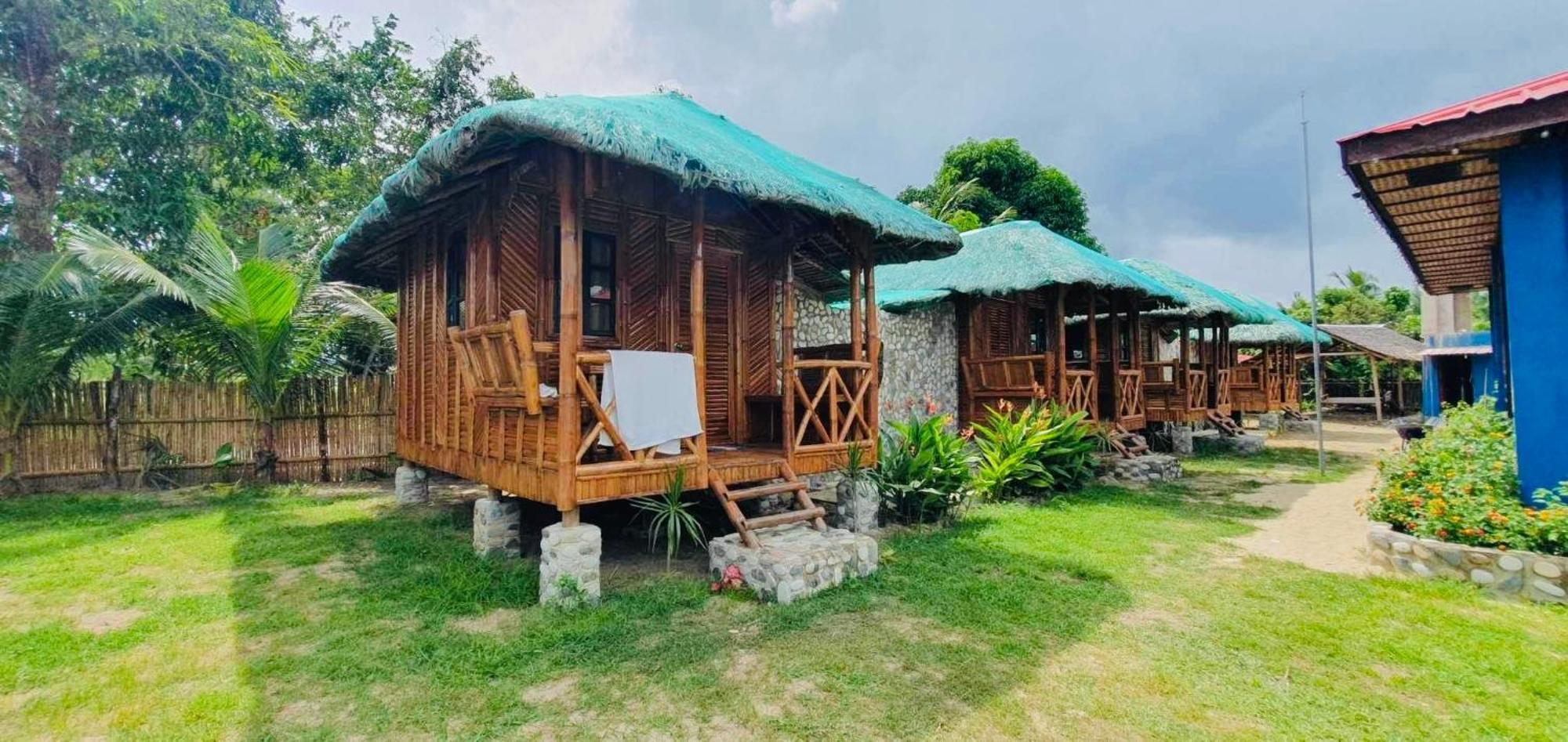 Mecaja Beach House Roxas  ภายนอก รูปภาพ